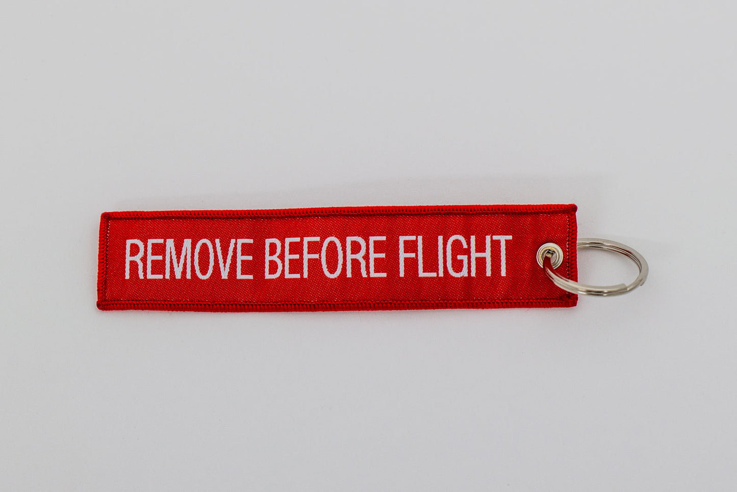 Schlüsselanhänger "Remove Before Flight"